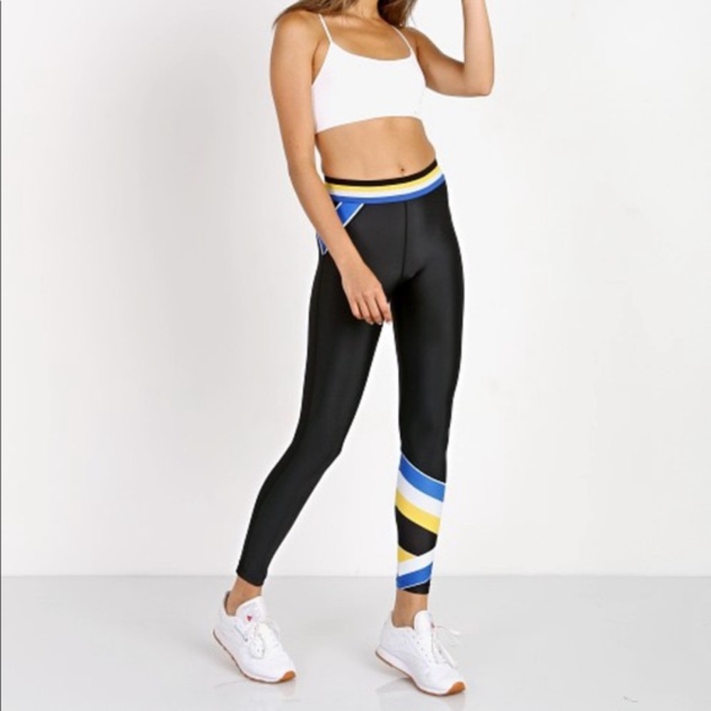 PE Nation leggings. “Centre Pass” style